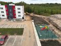 Два трёхэтажных многоквартирных дома построили в Парфине